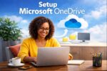 A woman setting up Microsoft OneDrive on her laptop to back up files securely to the cloud.