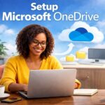 A woman setting up Microsoft OneDrive on her laptop to back up files securely to the cloud.