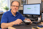 PCRuns owner-technician John Zettel evaluating a hard drive for data recovery