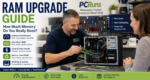 Technician installing RAM memory into a desktop computer while explaining upgrade options to a customer.