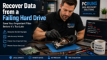 Computer technician recovering important files from a failing hard drive before complete drive failure.